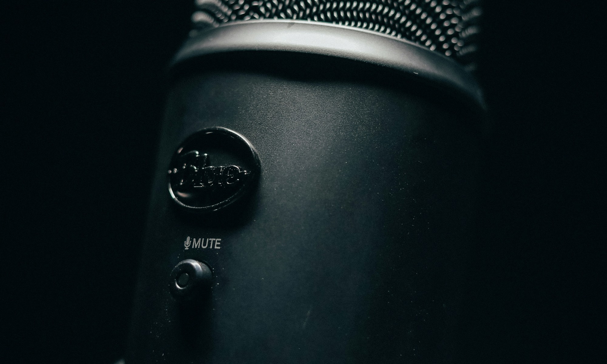 Microphone on dark background.